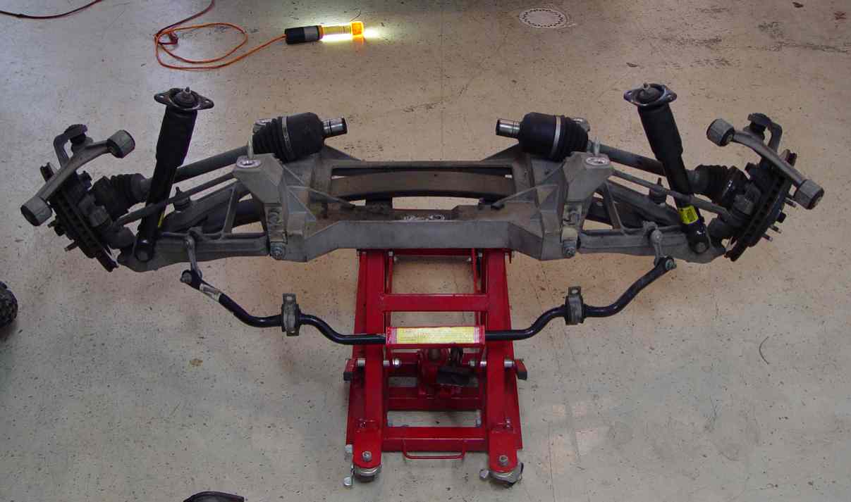 Fig. 15 Rear suspension cradle removed from the car. 