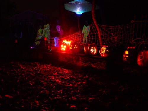 The far left shows the electrocuted pumpkin - It was lit up with a road flare! Sparks shot out of his mouth!